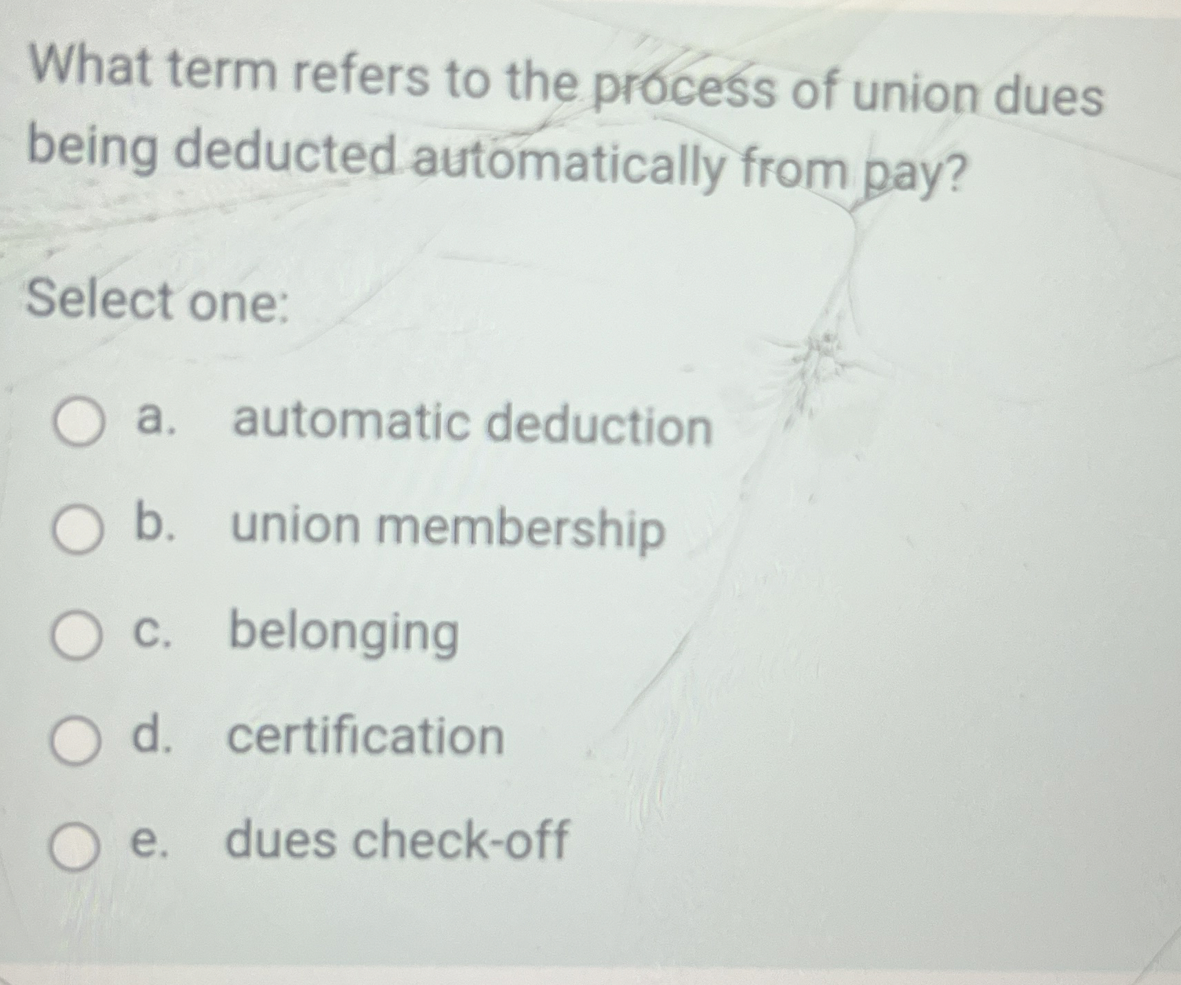 What term refers to the process of union dues