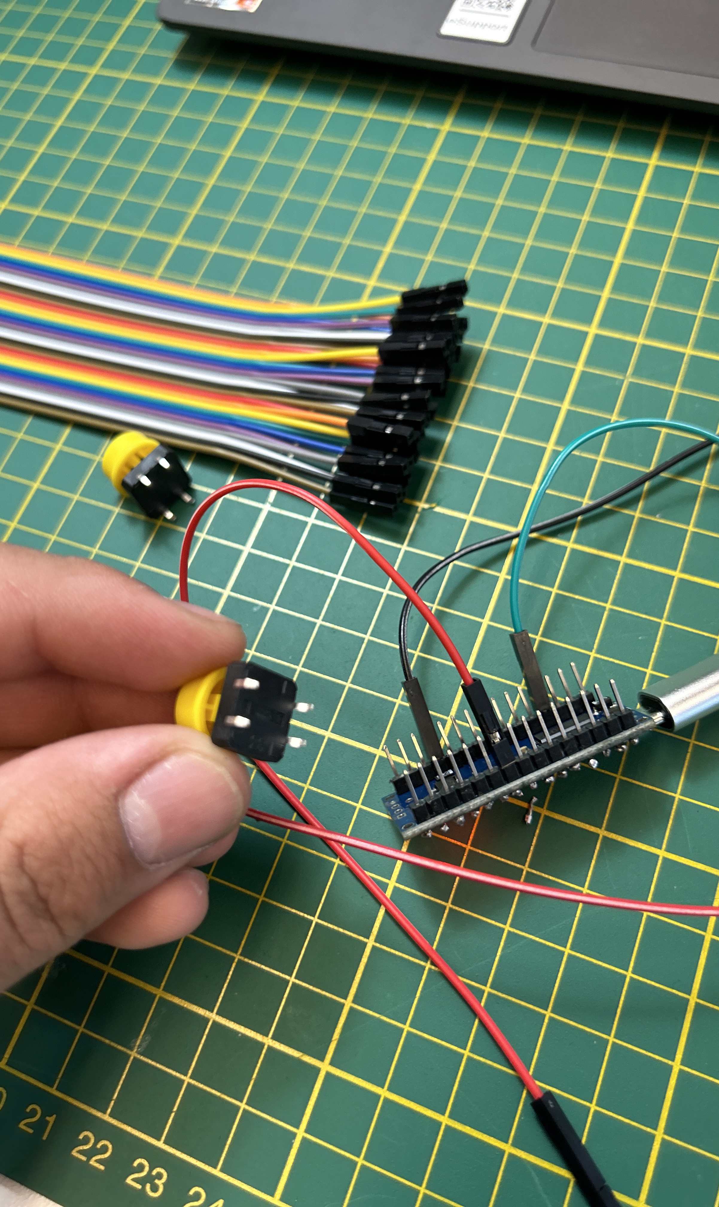 How do i connect a 4 pin tactile button to an