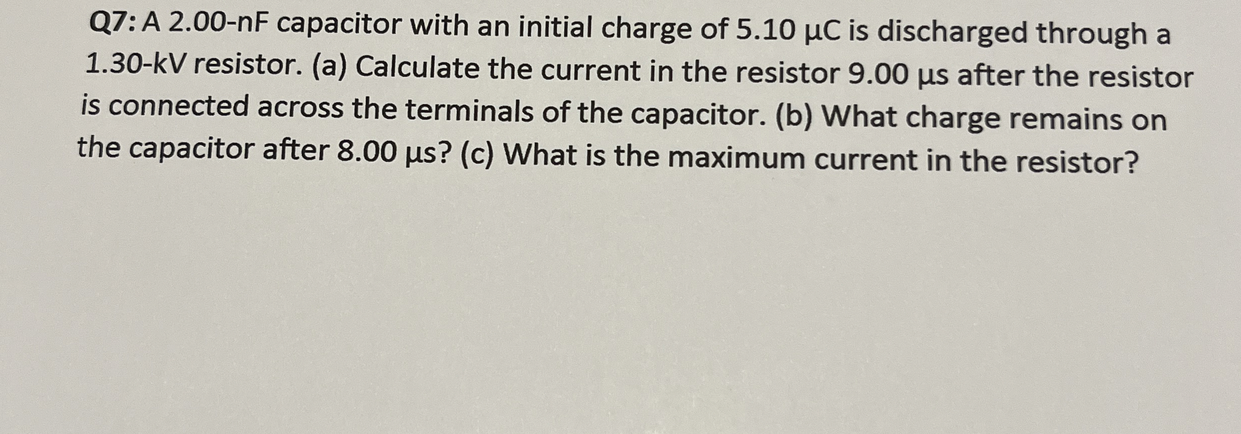 Q 7 : A 2 . 0 0 - nF capacitor with an initial
