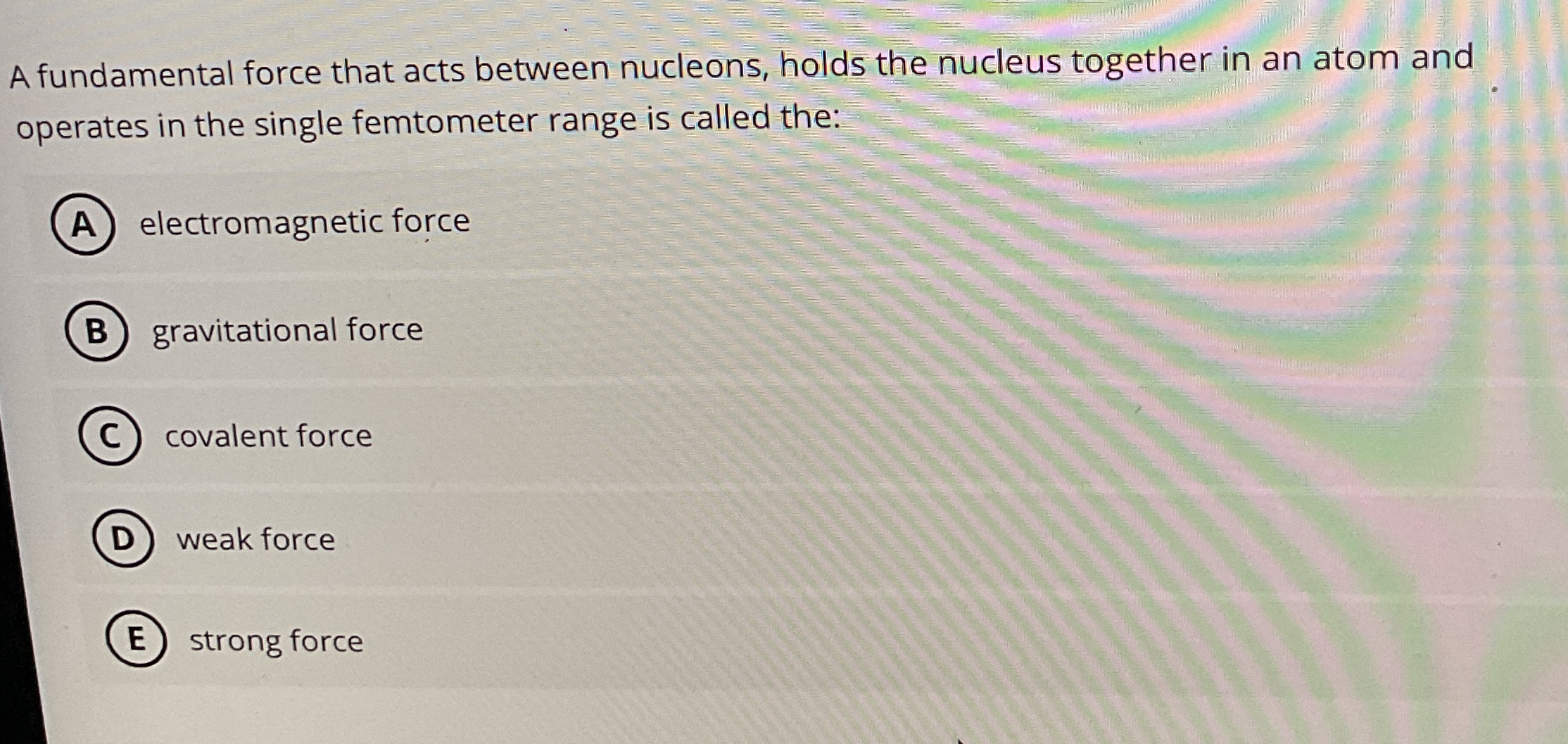 A fundamental force that acts between nucleons,