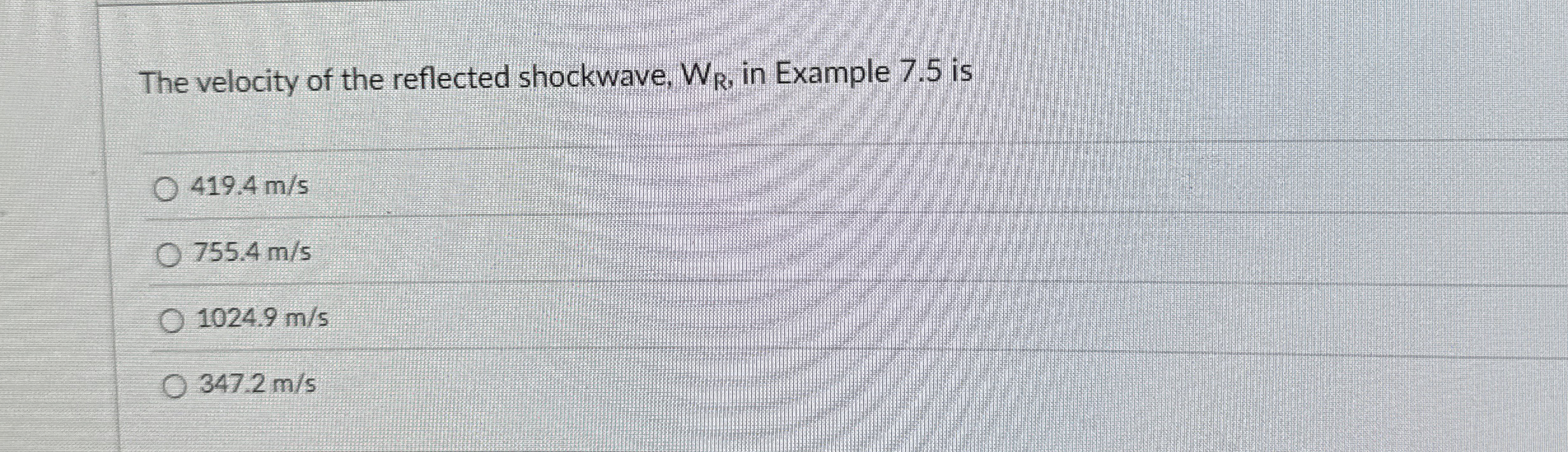The velocity of the reflected shockwave, W R , in