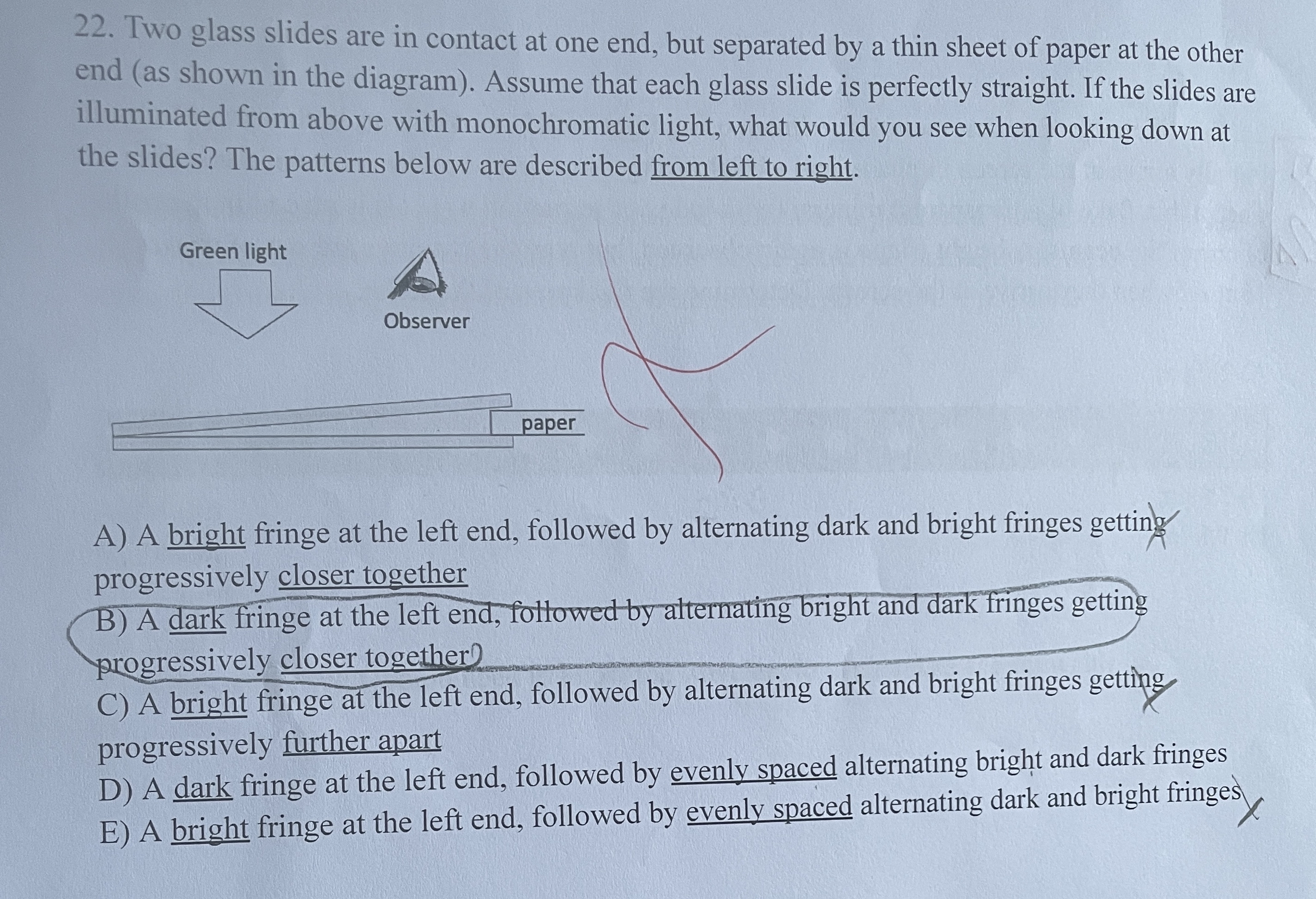 Two glass slides are in contact at one end, but