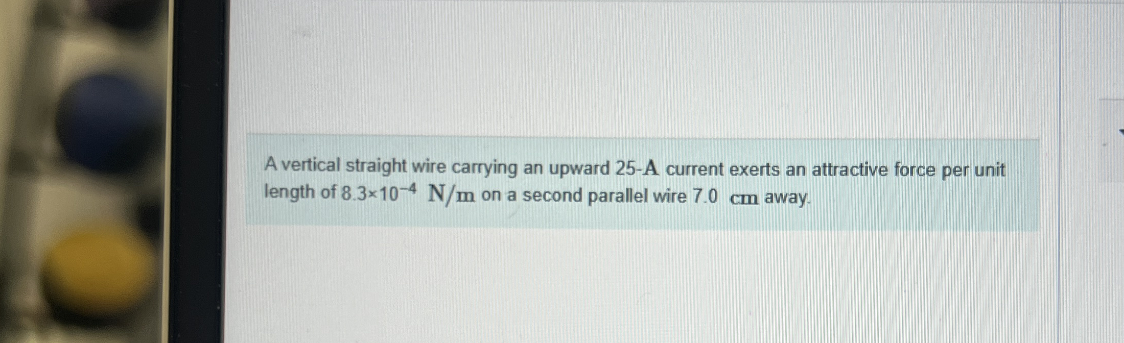 A vertical straight wire carrying an upward 2 5 -