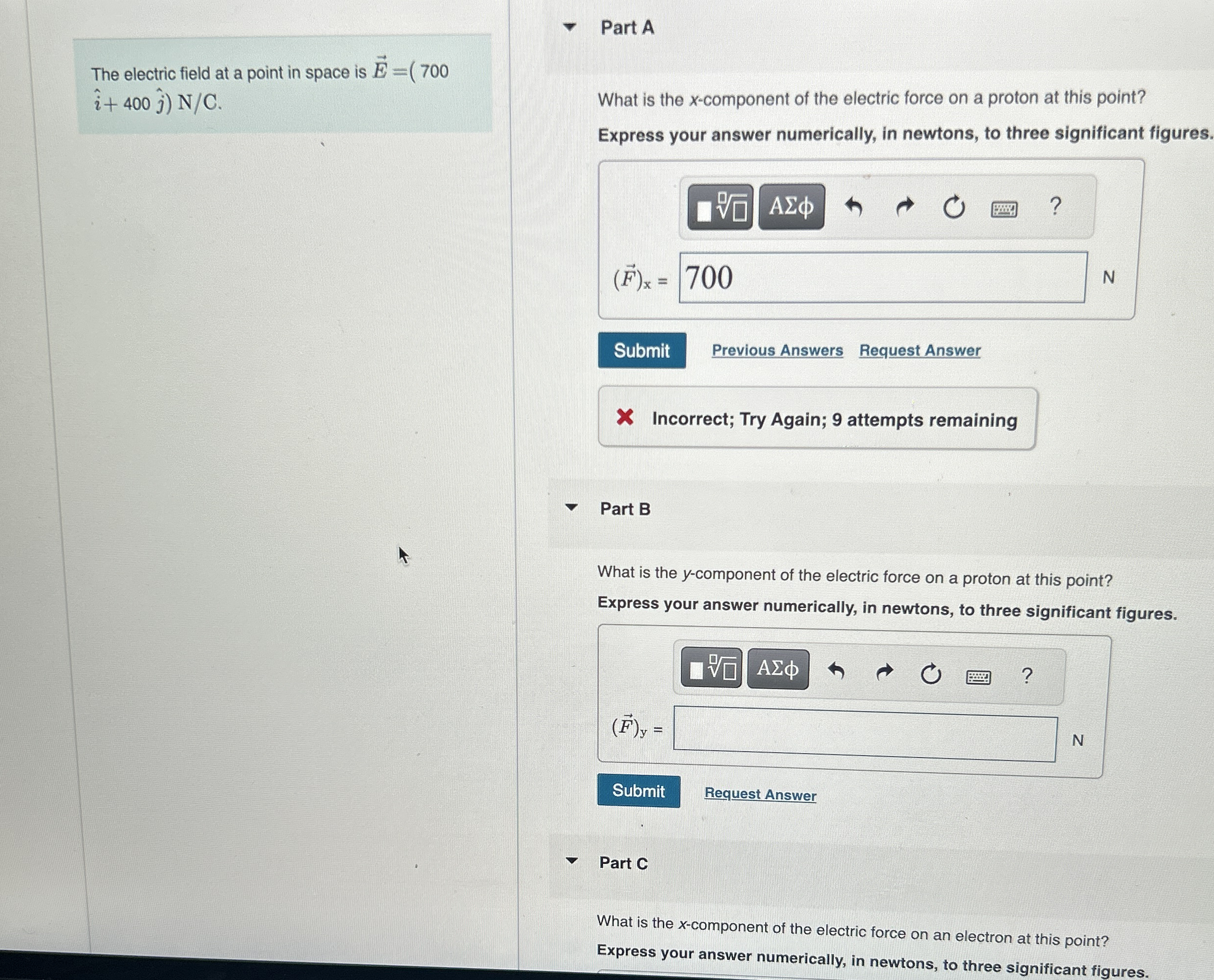 The electric field at a point in space is hat ( i