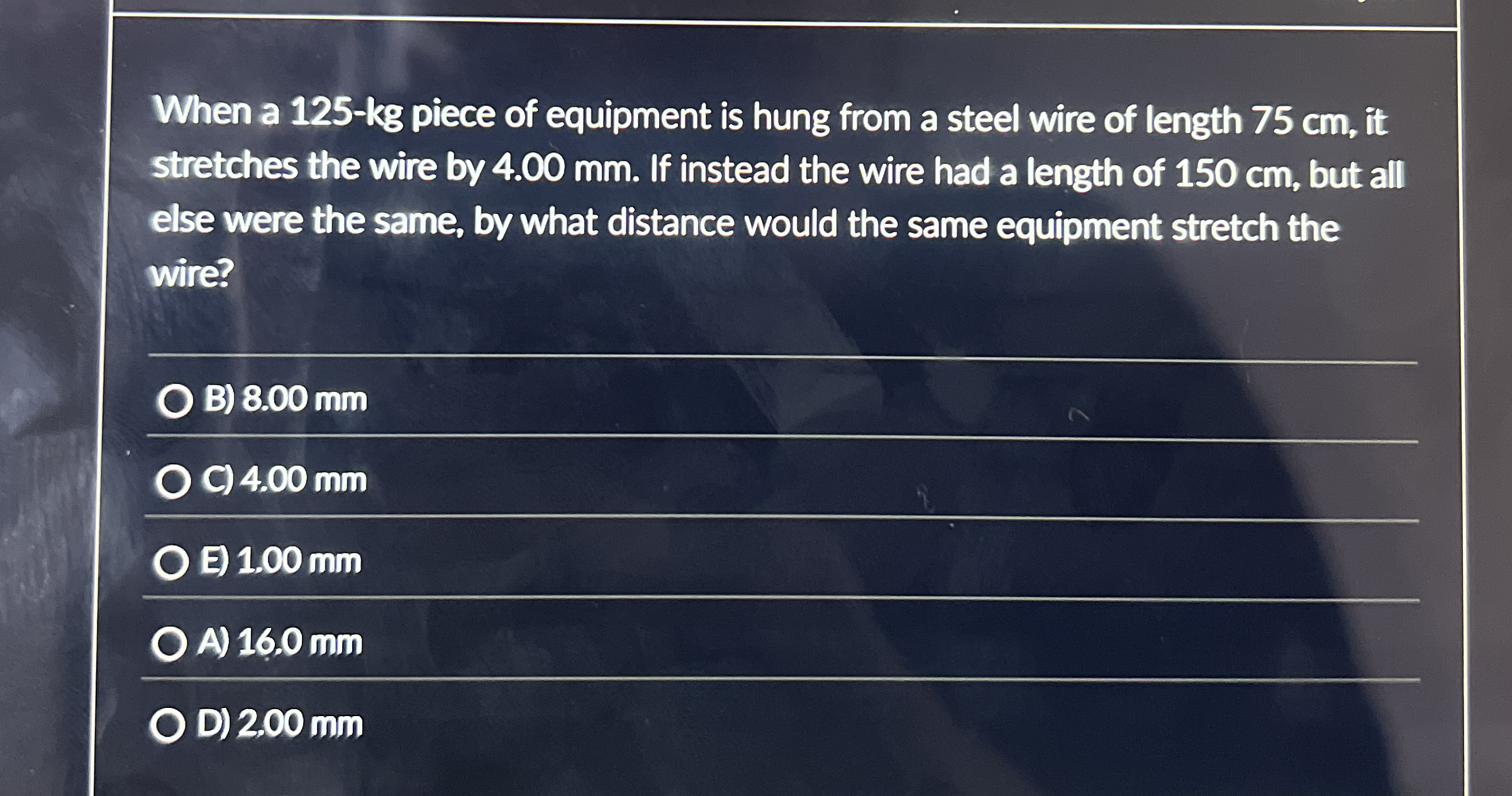 When a 1 2 5 - kg piece of equipment is hung from