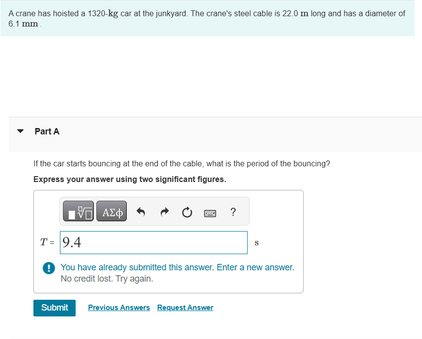 A crane has hoisted a 1 3 2 0 - kg car at the
