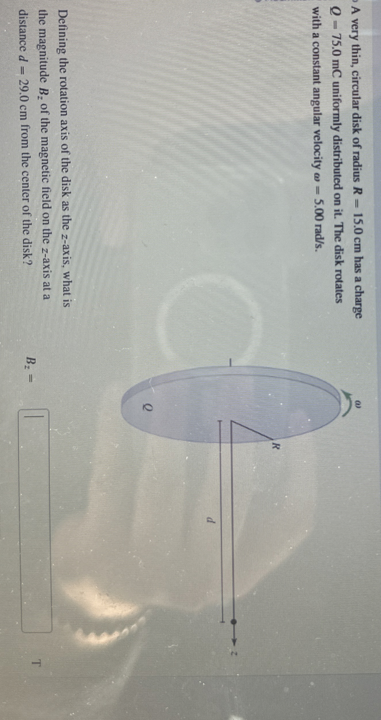A very thin, circular disk of radius R = 1 5 . 0