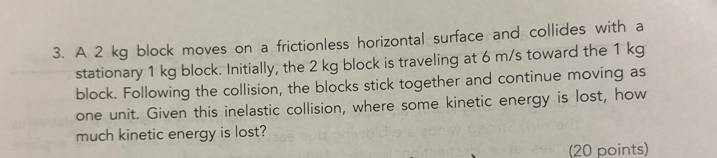 A 2 kg block moves on a frictionless horizontal
