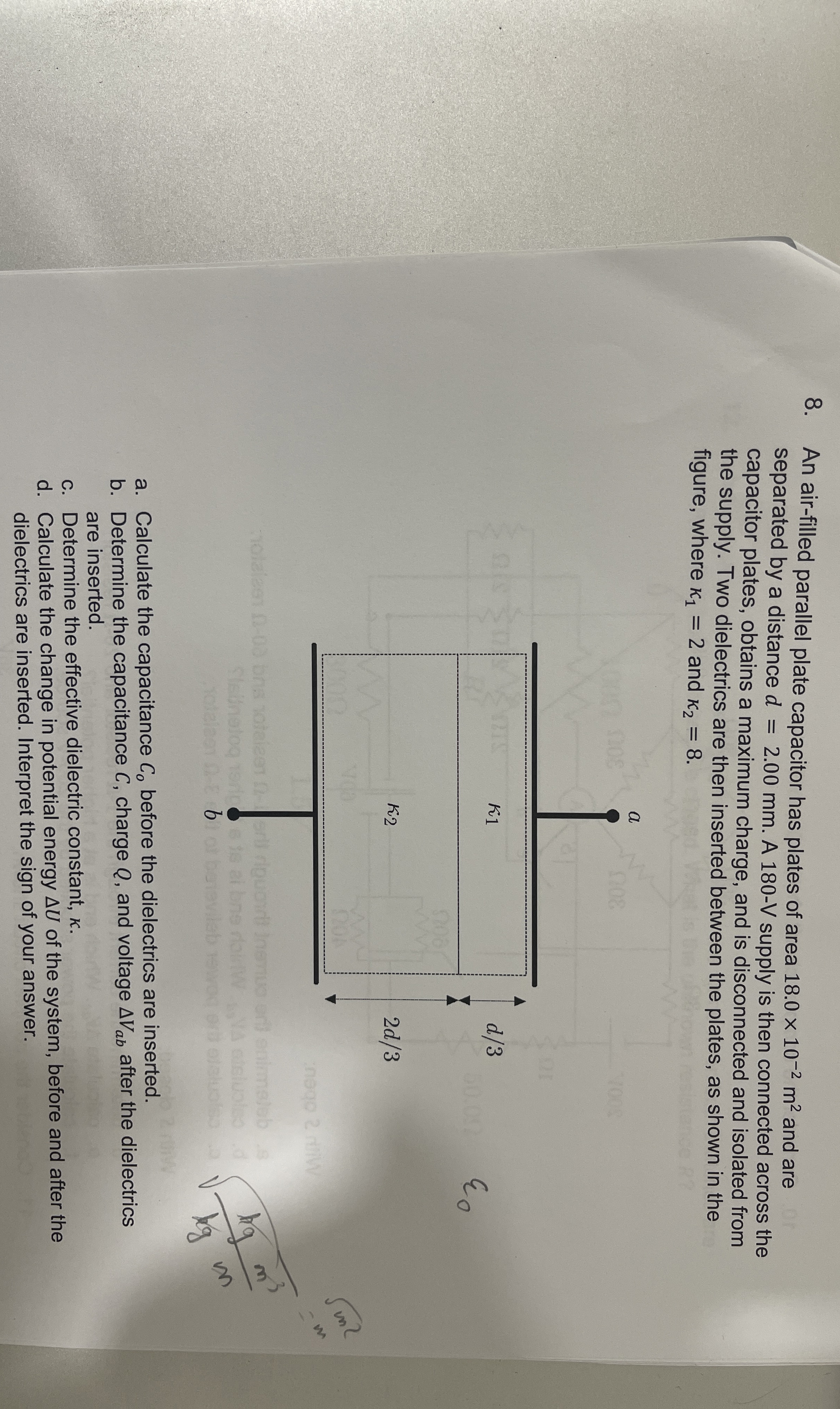 An air - filled parallel plate capacitor has