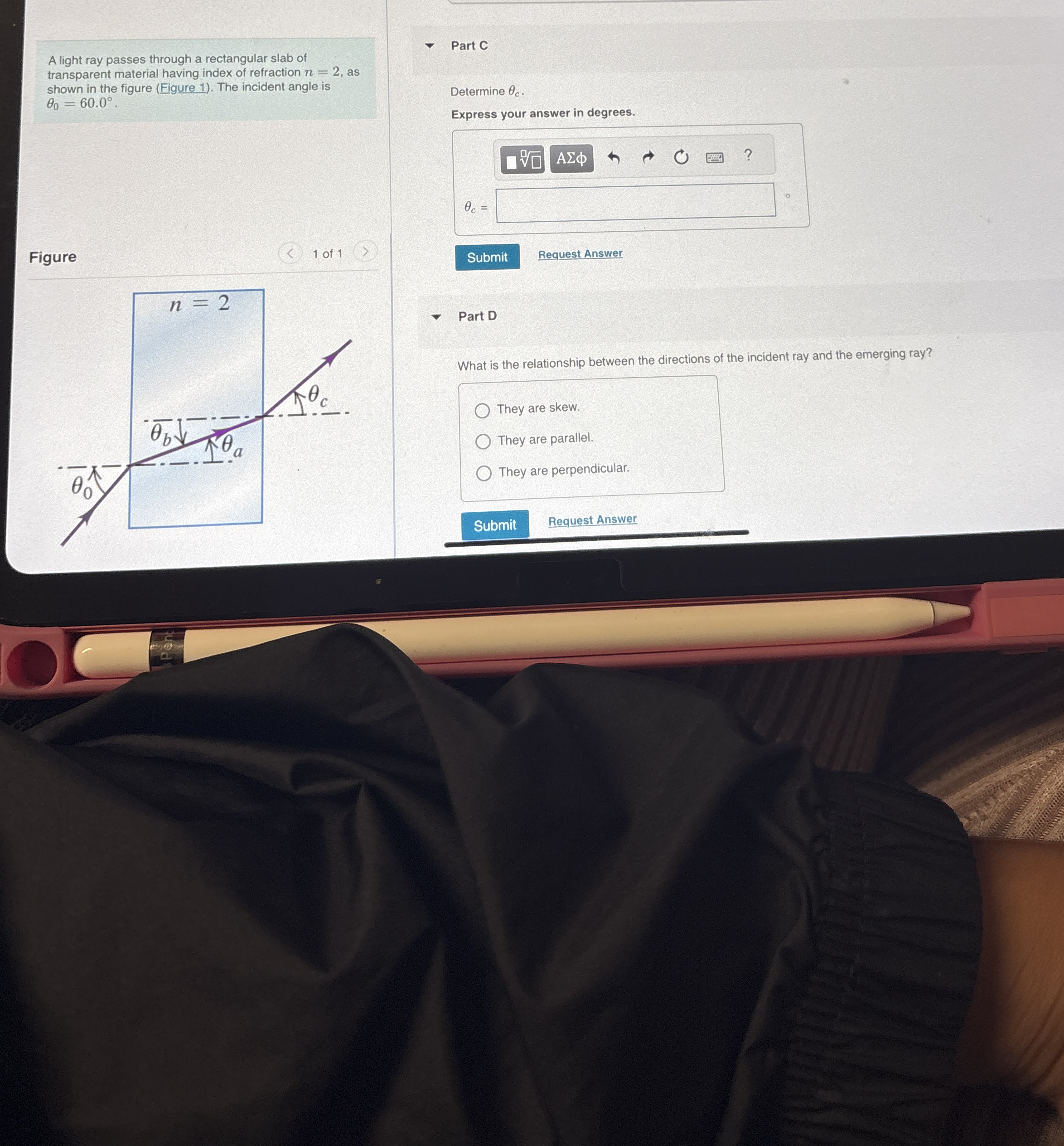 A light ray passes through a rectangular slab of