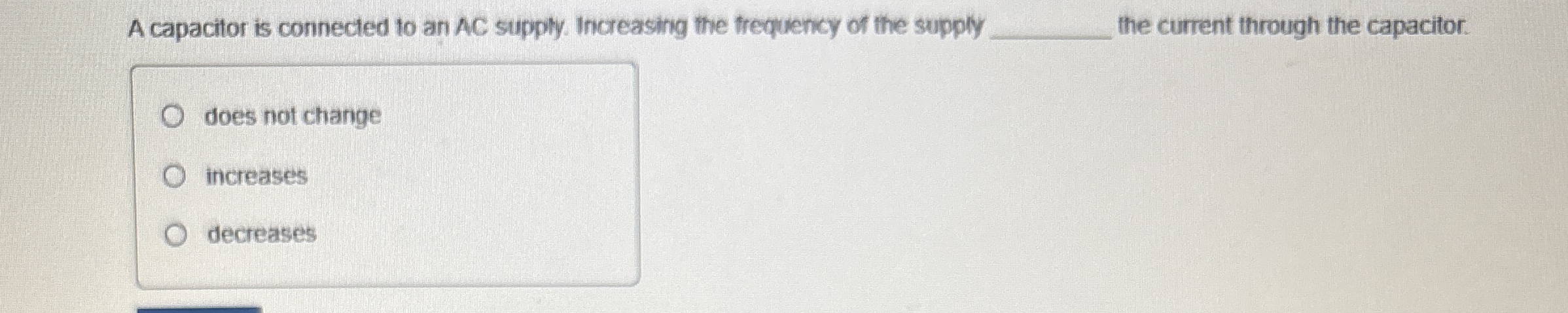 A capacitor is connected to an AC supply.