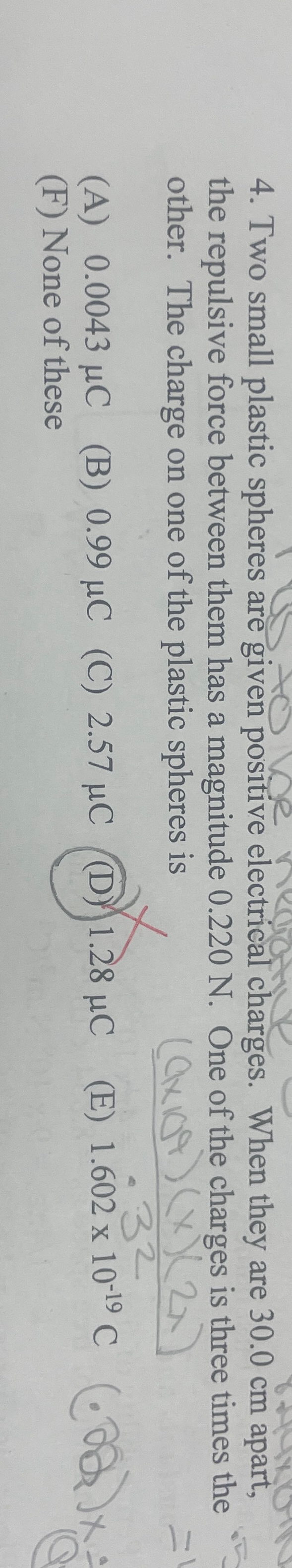 Two small plastic spheres are given positive