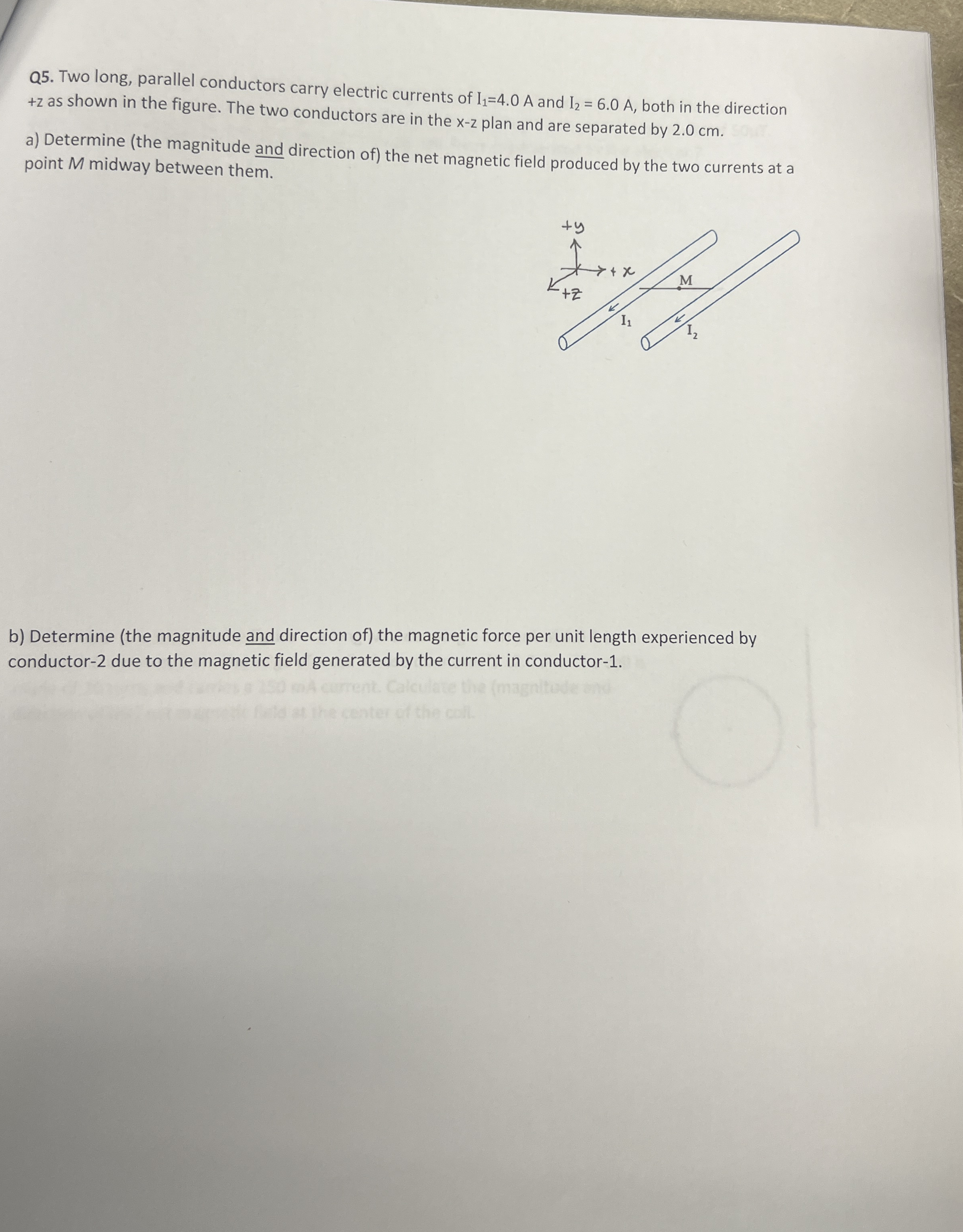 Q 5 . Two long, parallel conductors carry