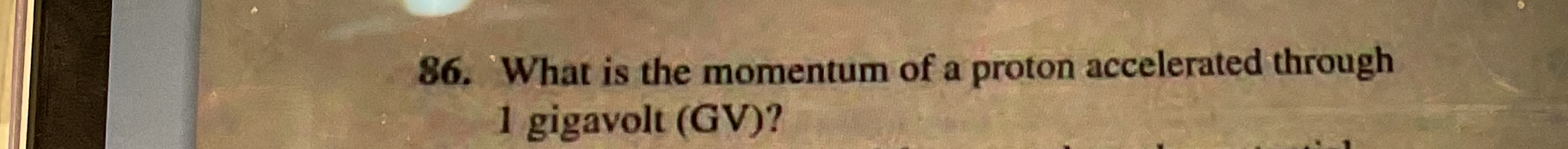 What is the momentum of a proton accelerated