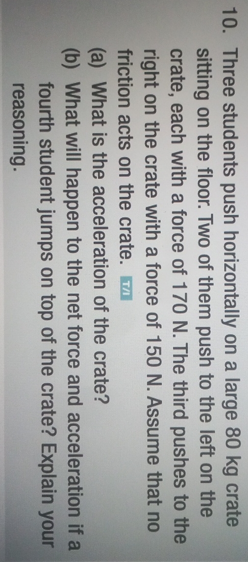 Three students push horizontally on a large 8 0