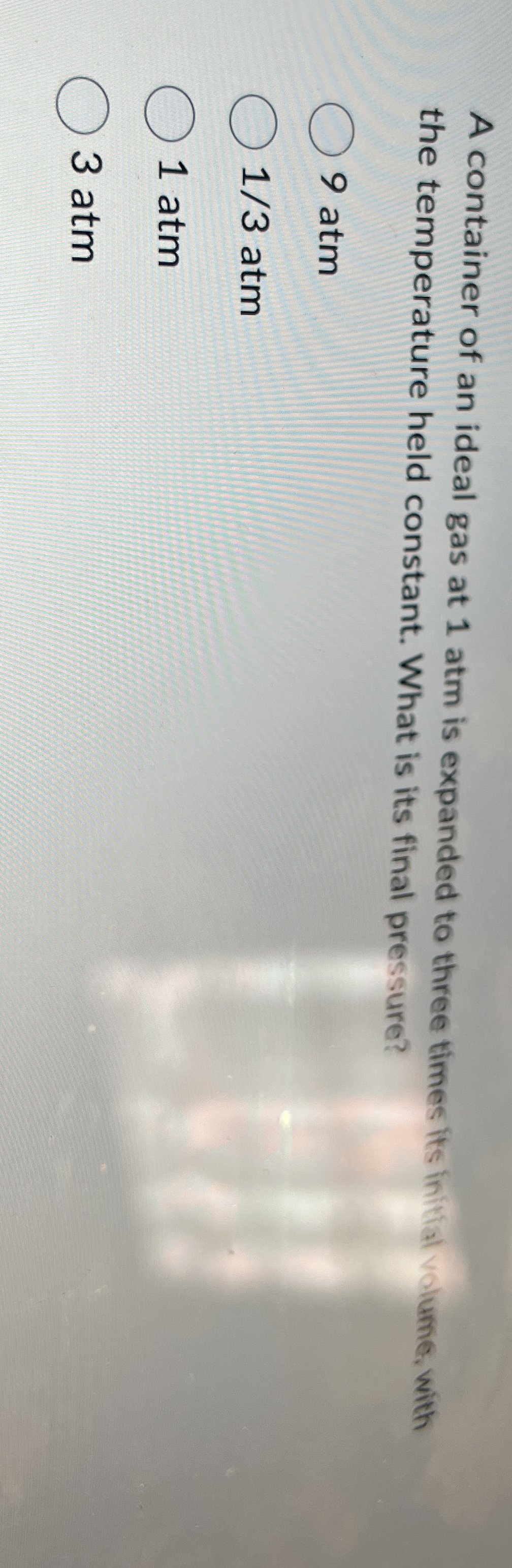 A container of an ideal gas at 1 atm is expanded