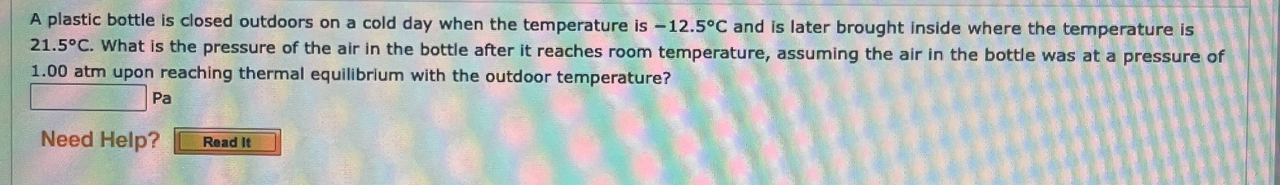 A plastic bottle is closed outdoors on a cold day