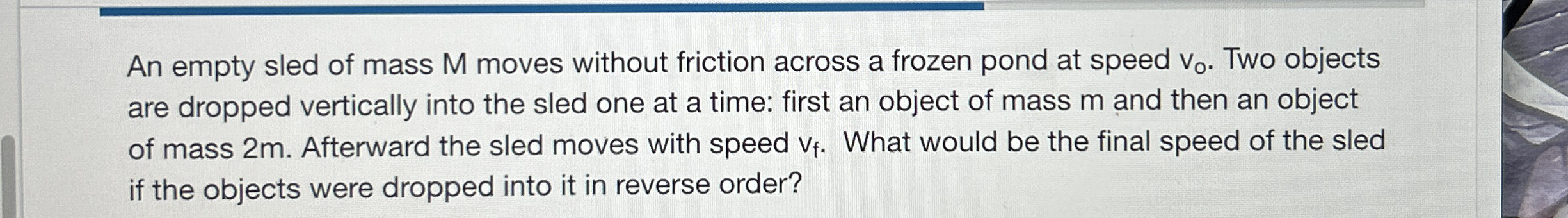 An empty sled of mass M moves without friction
