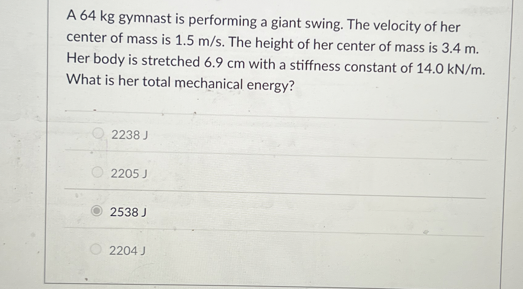 A 6 4 kg gymnast is performing a giant swing. The
