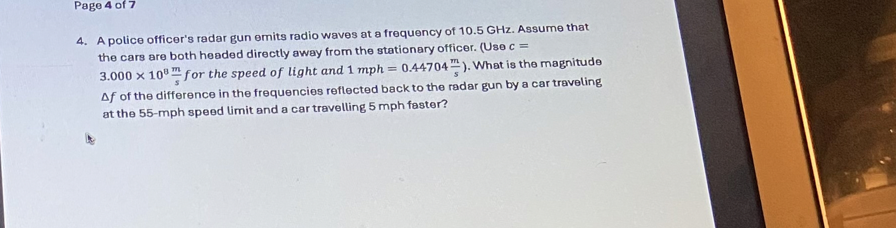 A police officer's radar gun emits radio waves at