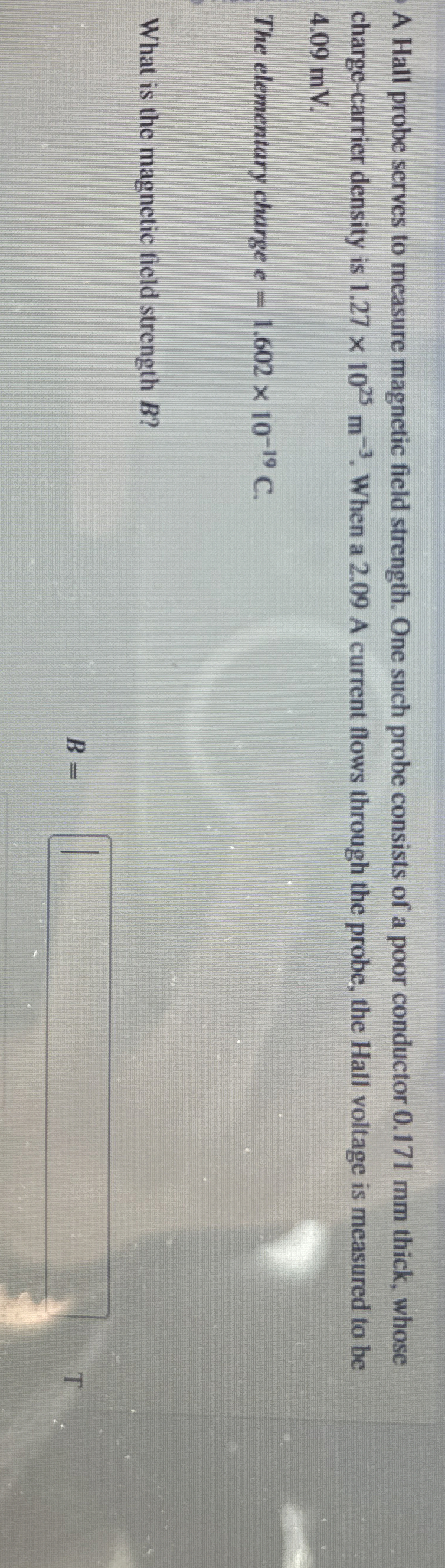 A Hall probe serves to measure magnetic field