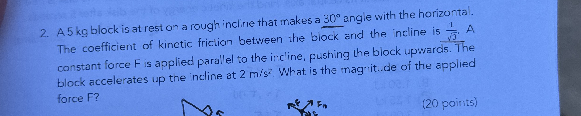 A 5 k g block is at rest on a rough incline that