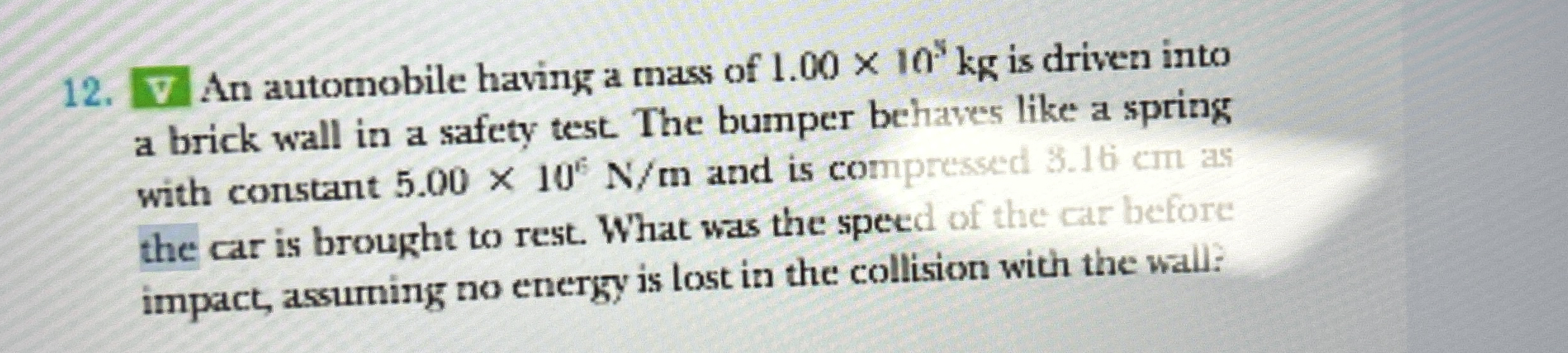 ? V An automobile having a mass of 1 . 0 0 1 0 5