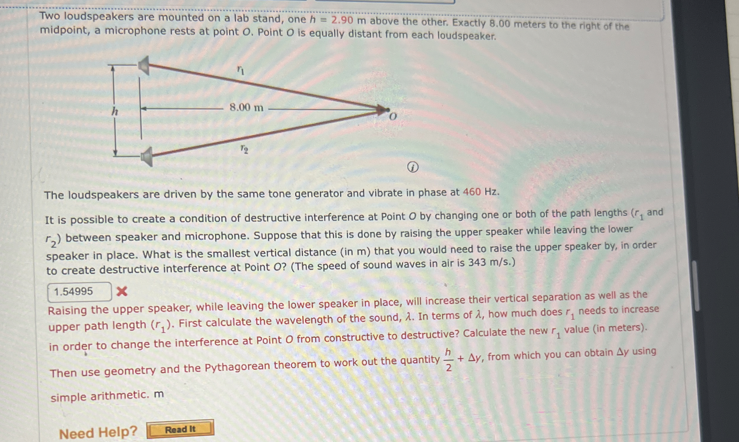 Two loudspeakers are mounted on a lab stand, one