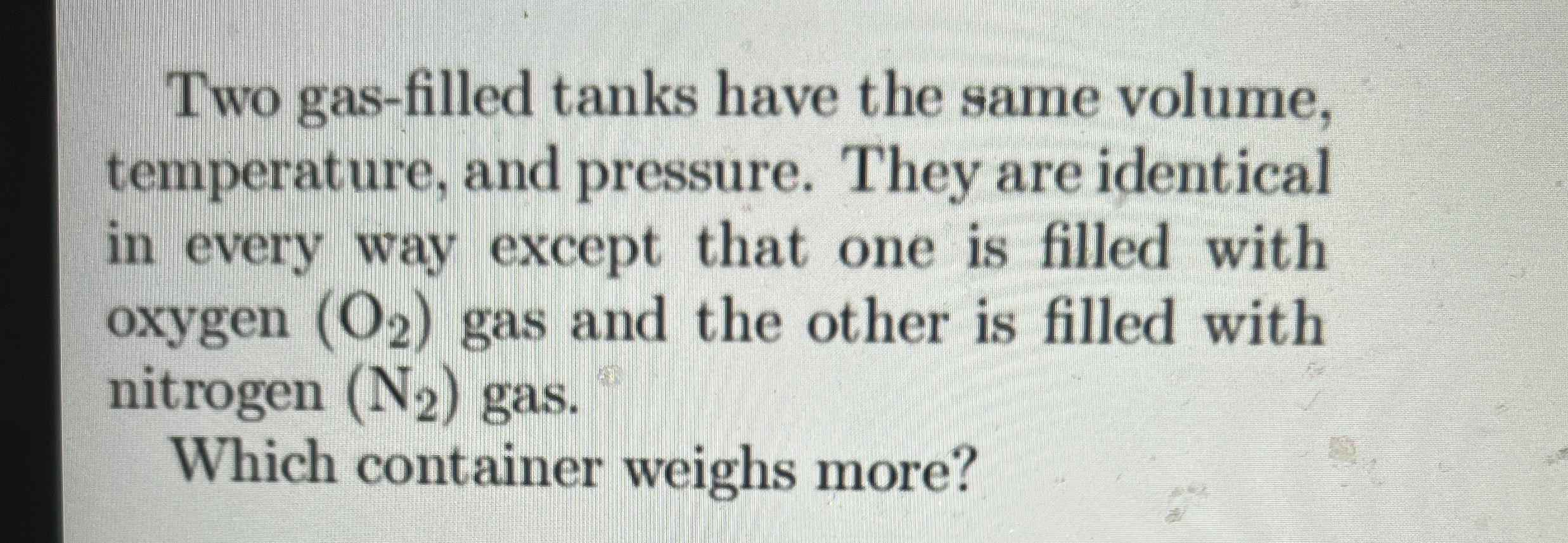 Two gas - filled tanks have the same volume,
