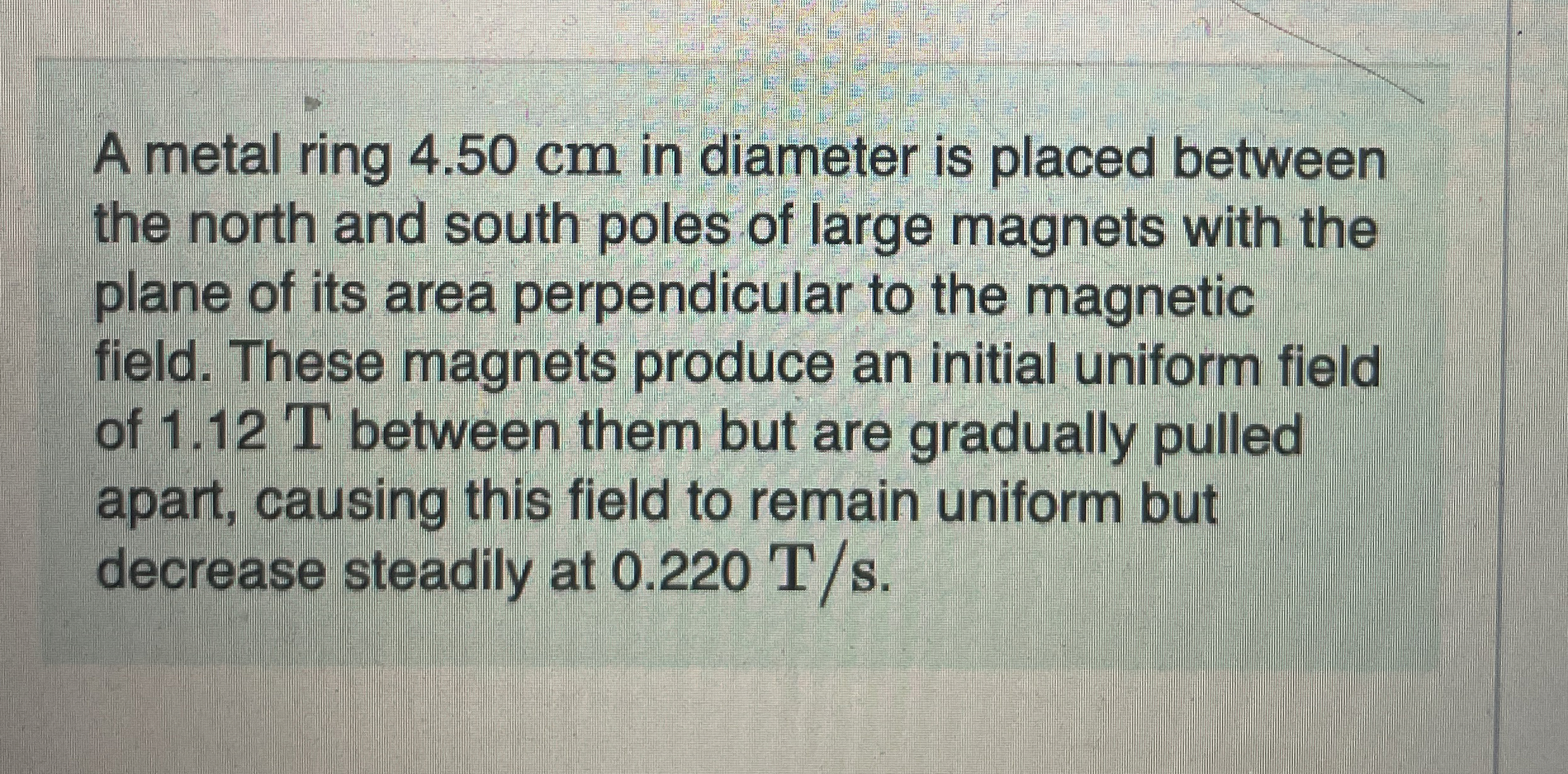 A metal ring 4 . 5 0 cm in diameter is placed