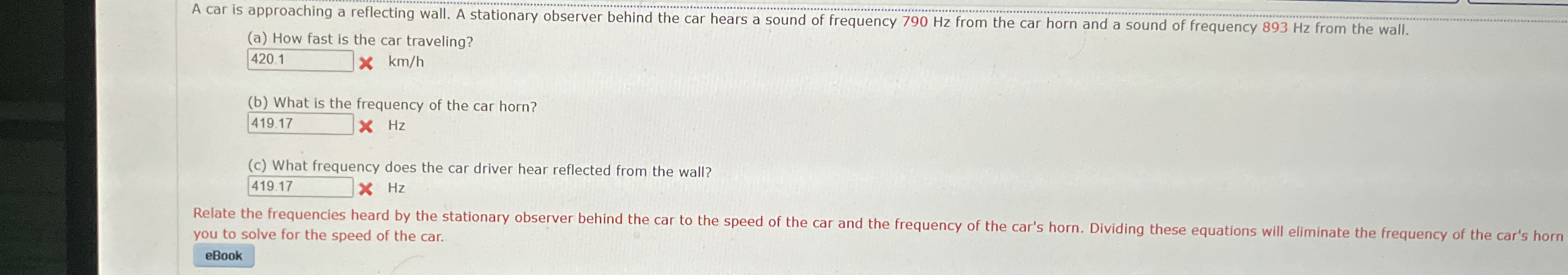 A car is approaching a reflecting wall. A