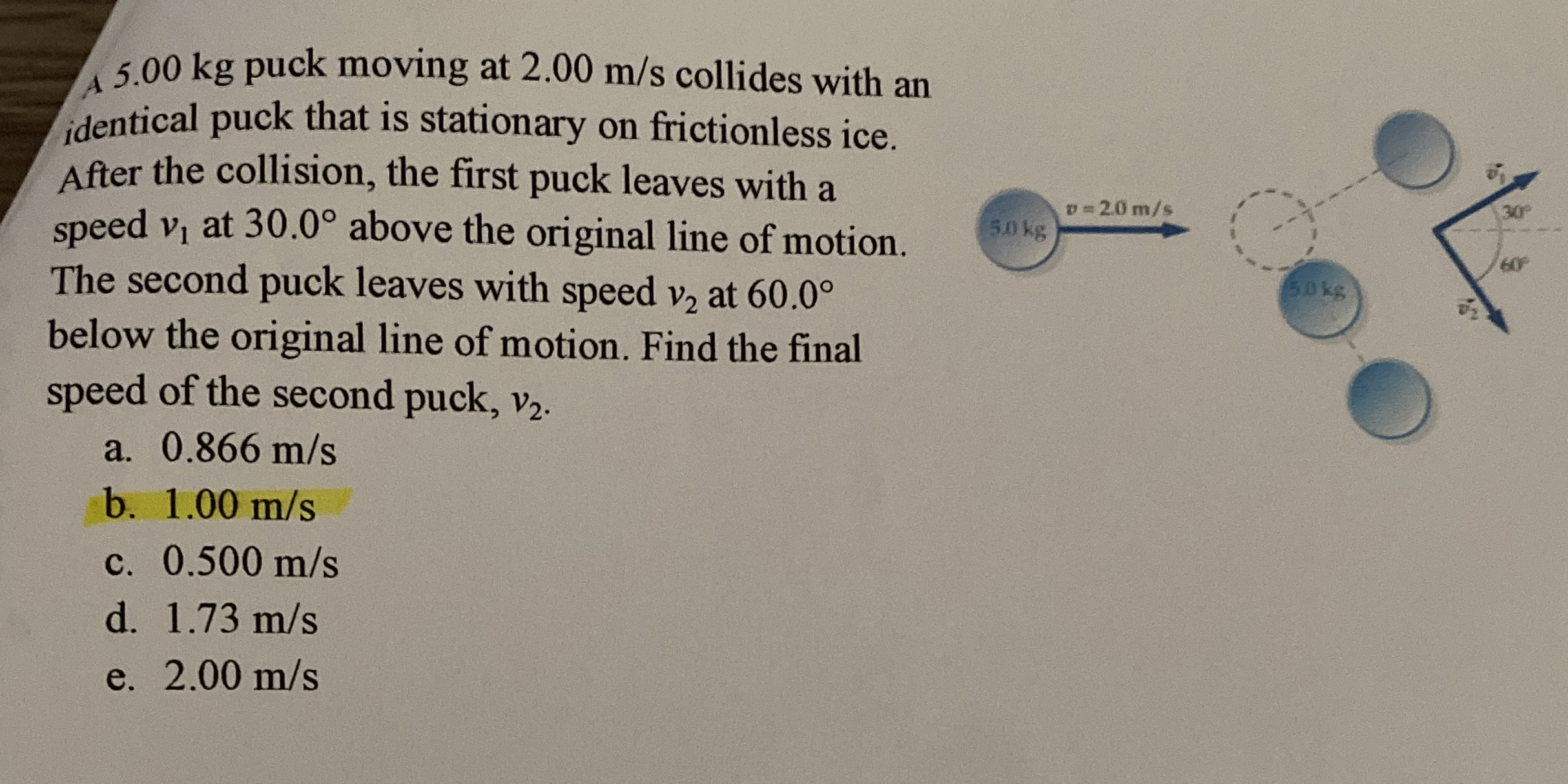 A 5 . 0 0 kg puck moving at 2 . 0 0 m s collides