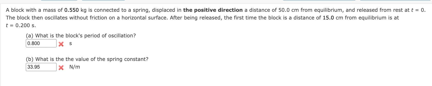 A block with a mass of 0 . 5 5 0 kg is connected