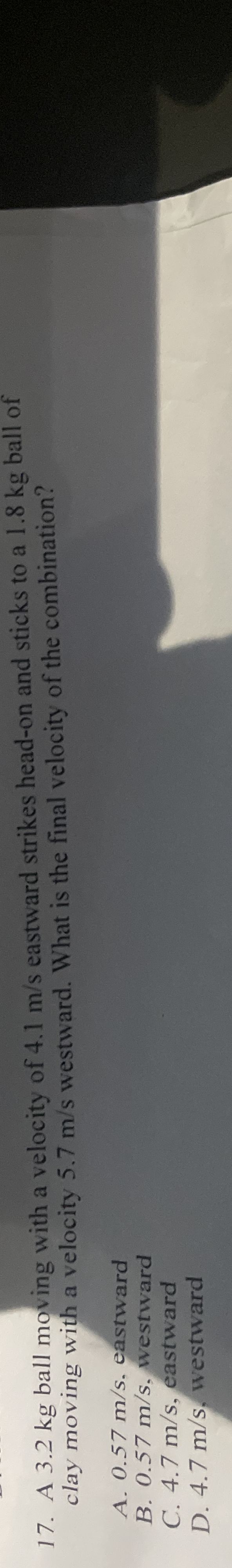 A 3 . 2 kg ball moving with a velocity of 4 . 1 m