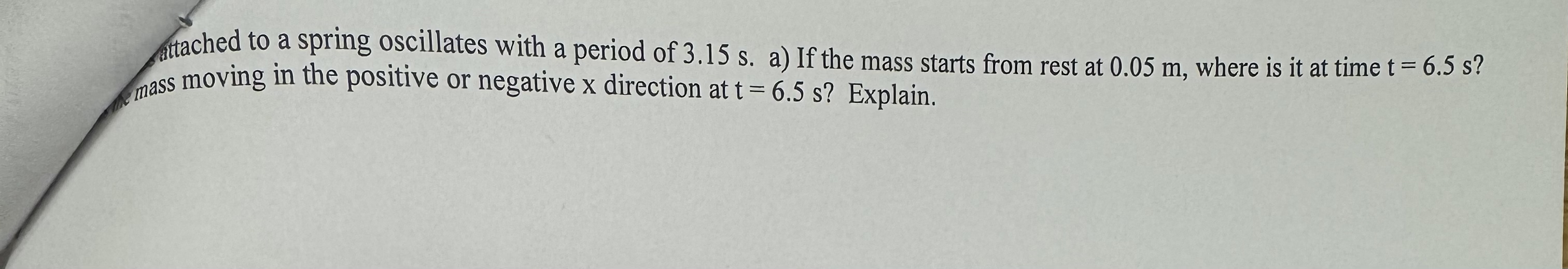 Attached to a spring oscillates with a period of