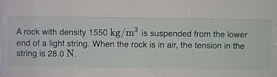 A rock with density 1 5 5 0 k g m 3 is suspended
