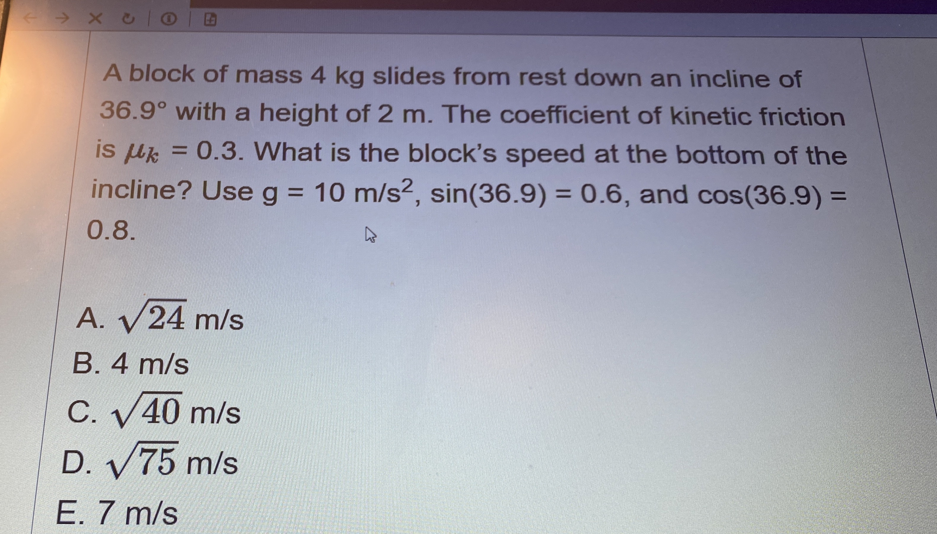 A block of mass 4 kg slides from rest down an