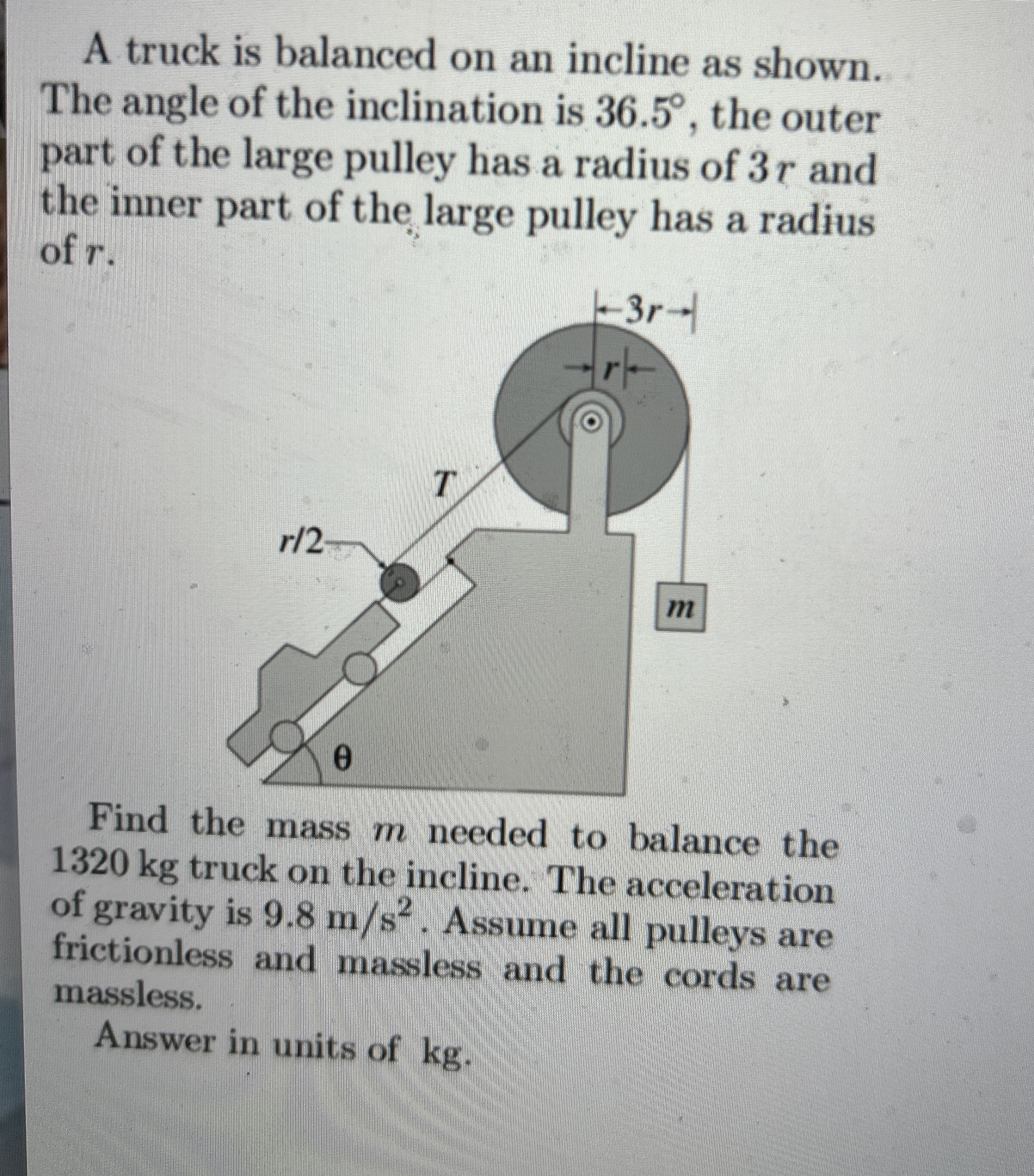 A truck is balanced on an incline as shown. The