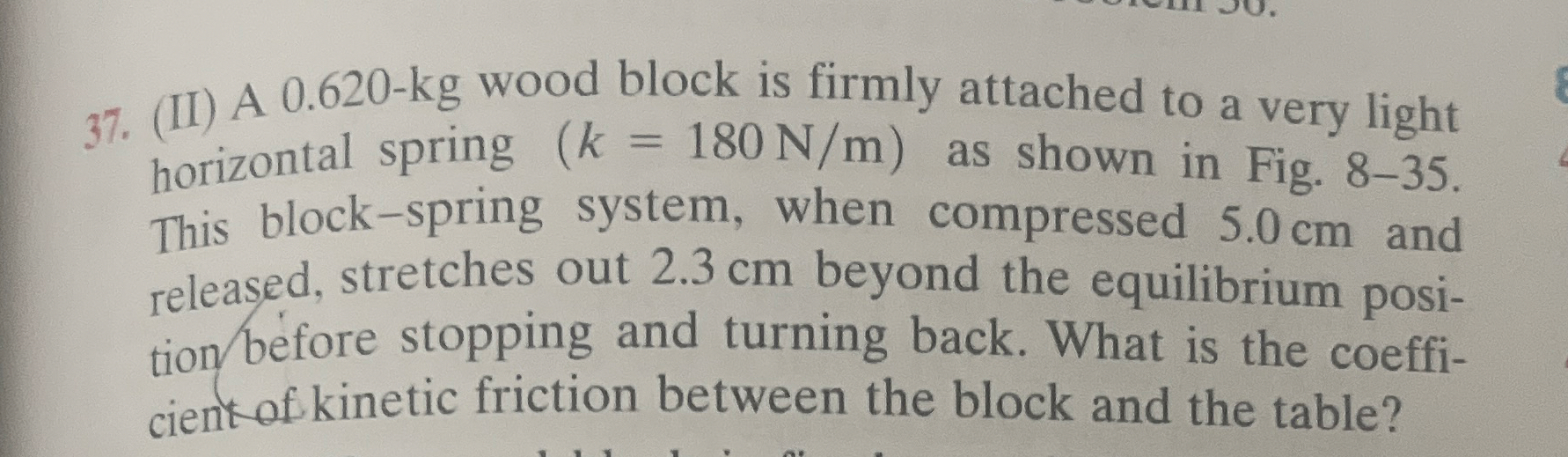 ( II ) A 0 . 6 2 0 - k g wood block is firmly