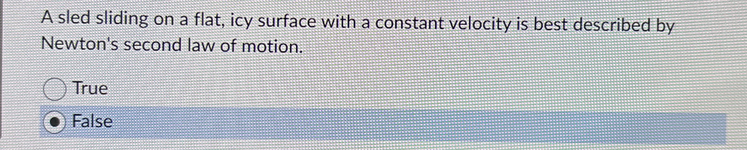 A sled sliding on a flat, icy surface with a