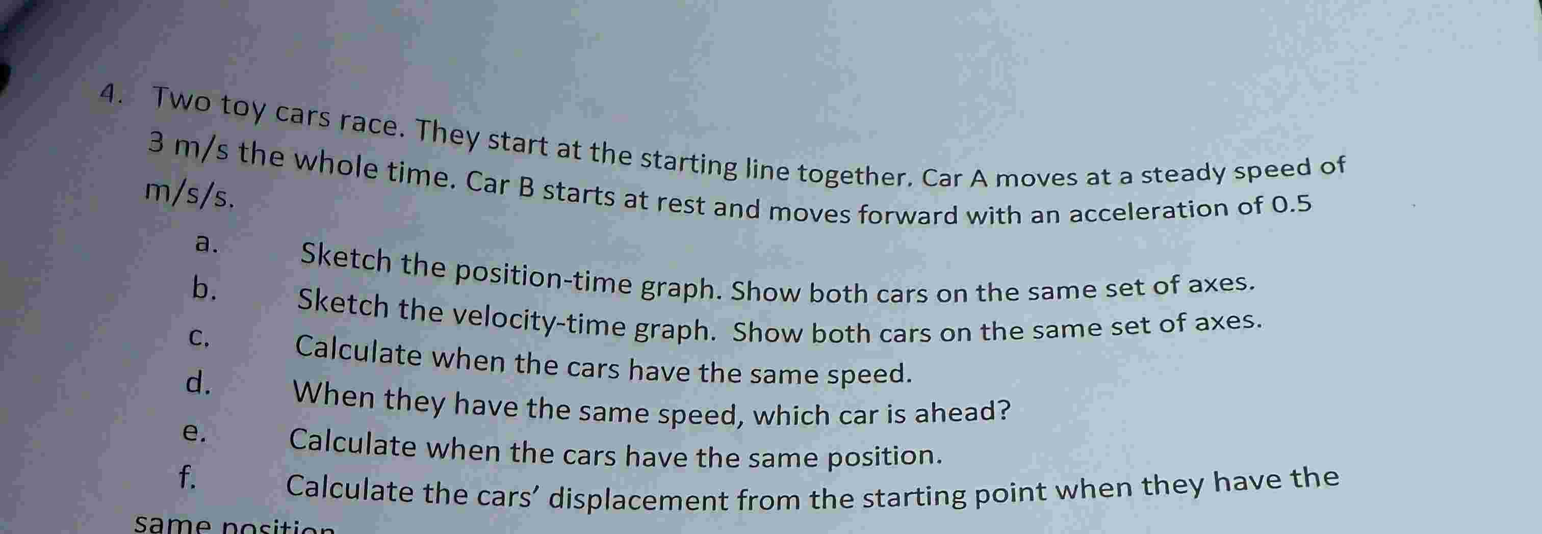 Two toy cars race. They start at the starting