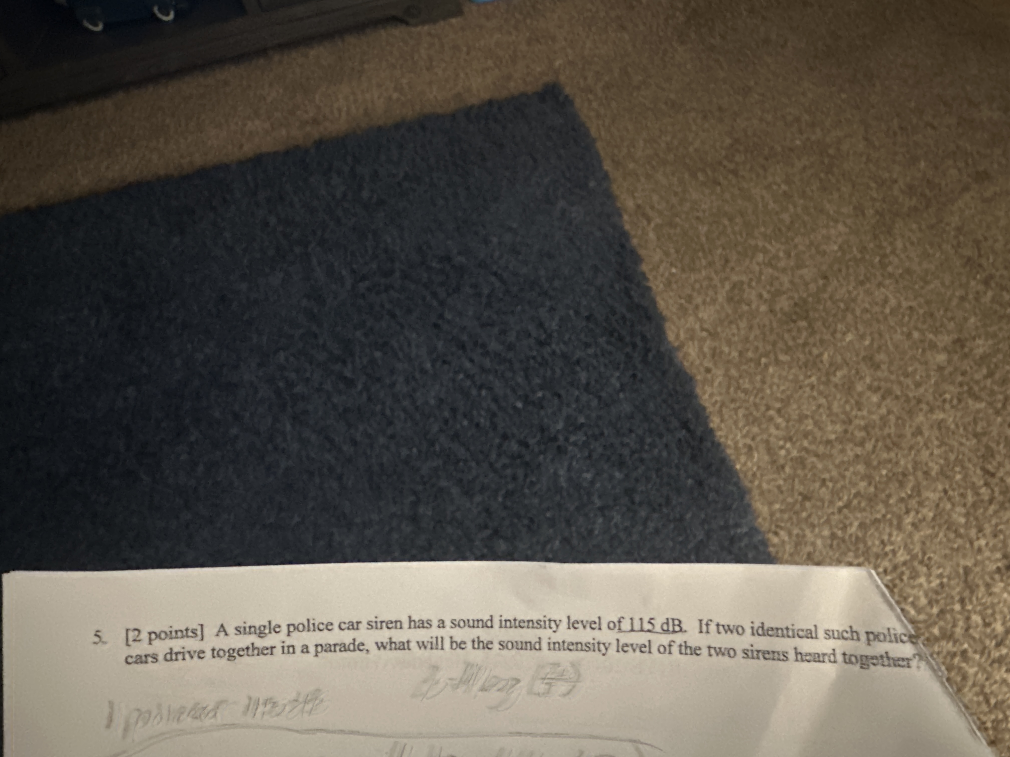 5 . [ 2 points ] A single police car siren has a