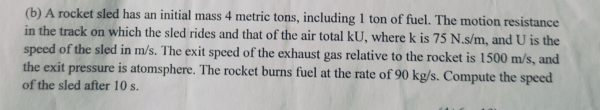 ( b ) A rocket sled has an initial mass 4 metric