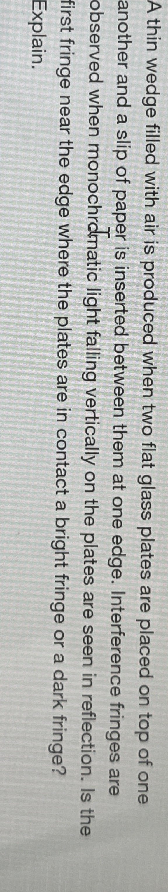 A thin wedge filled with air is produced when two