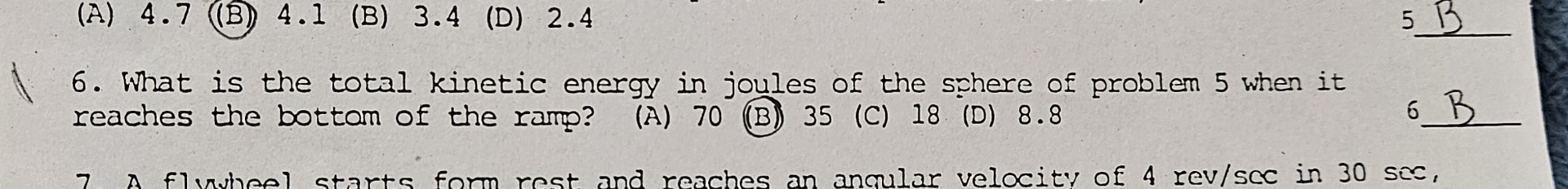 6 . What is the total kinetic energy in joules of