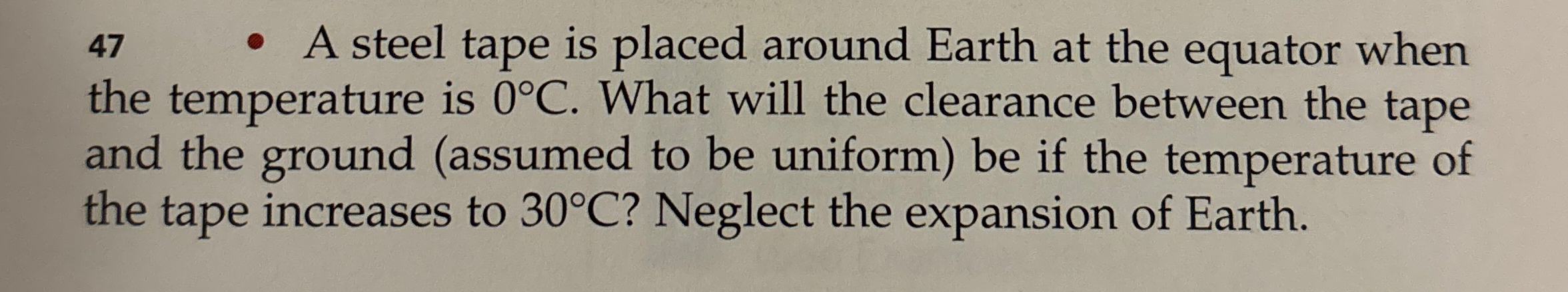 4 7 - A steel tape is placed around Earth at the