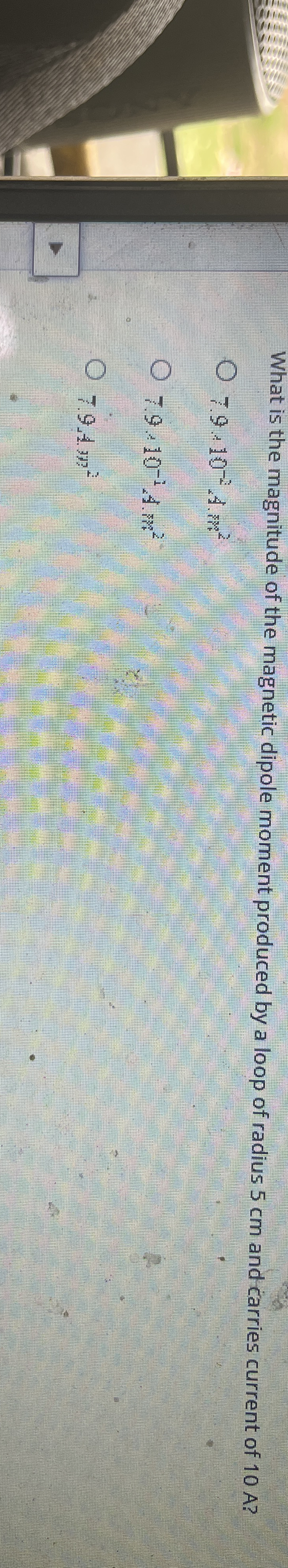 What is the magnitude of the magnetic dipole