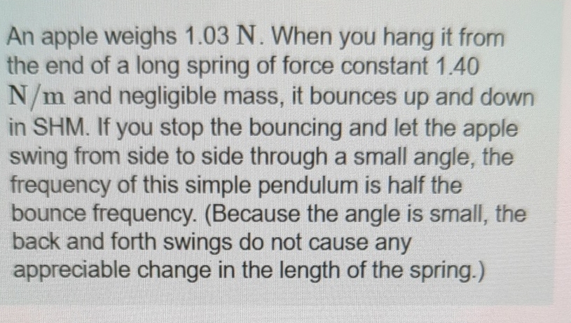 An apple weighs 1 . 0 3 N . When you hang it from