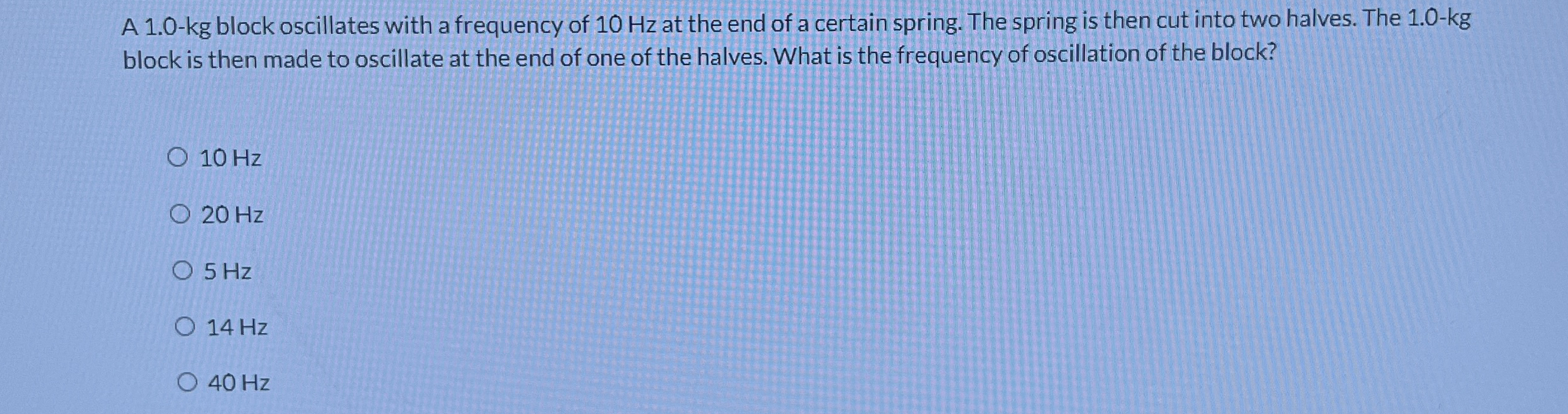 A 1 . 0 - kg block oscillates with a frequency of
