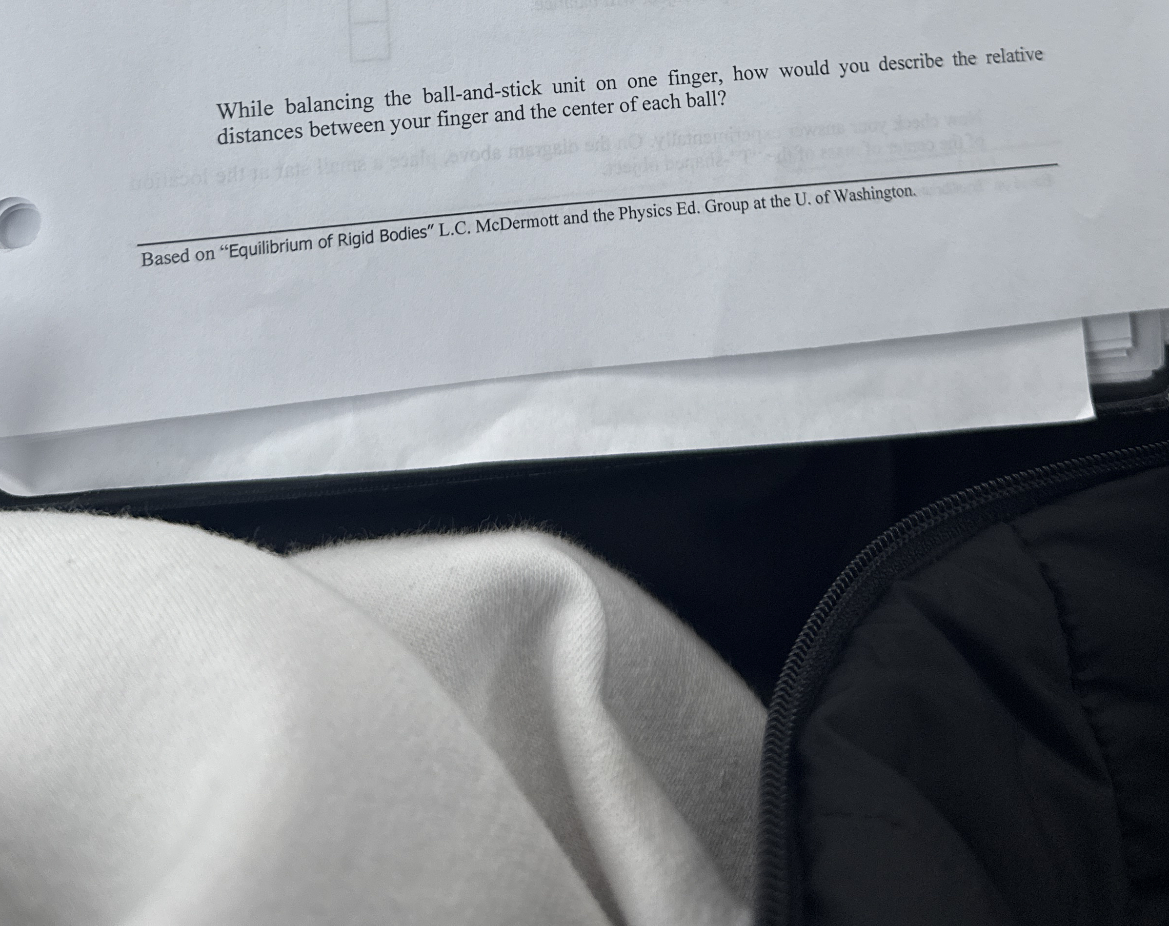 While balancing the ball - and - stick unit on